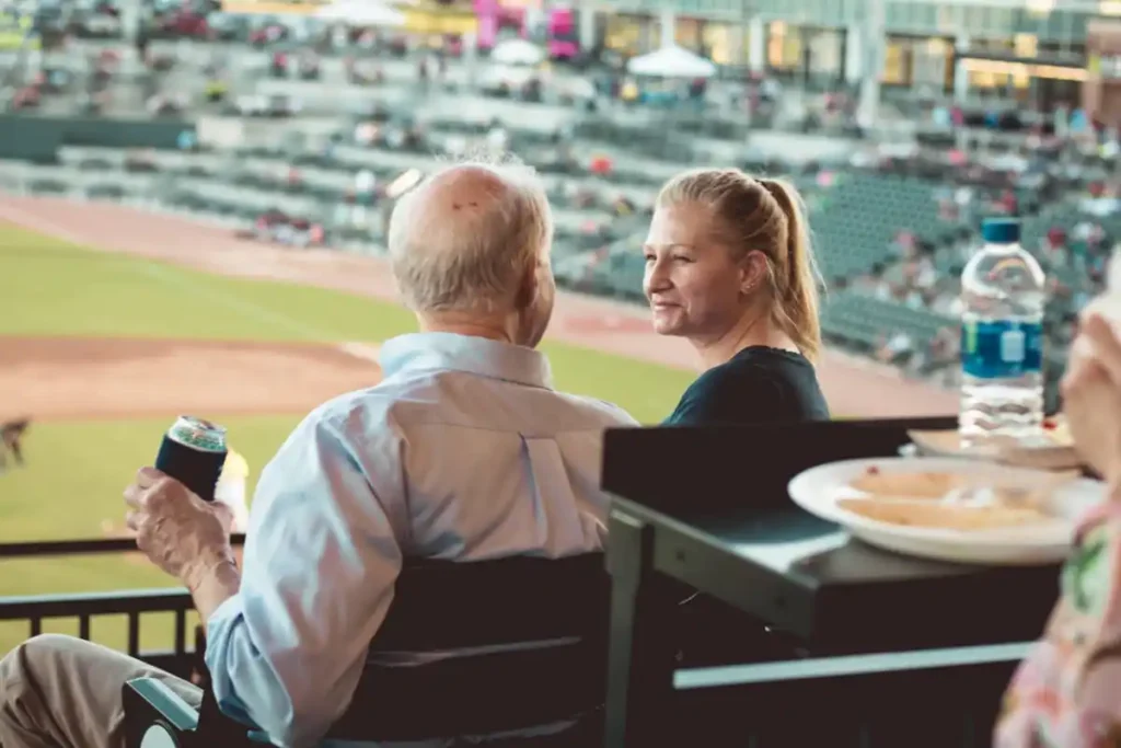 Members enjoying the baseball game